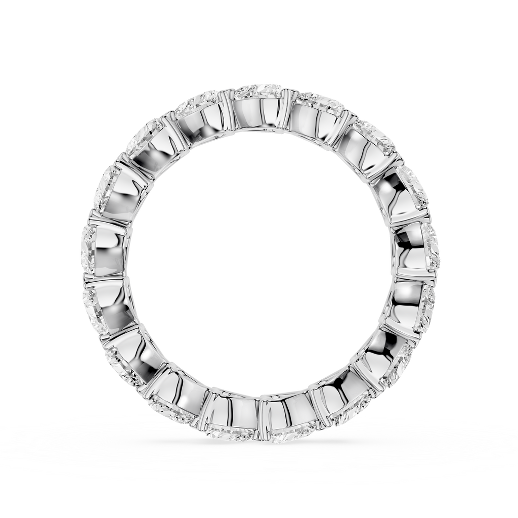 Silver ring with engraved design on a white background