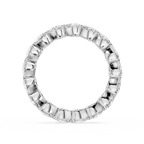Silver ring with engraved design on a white background