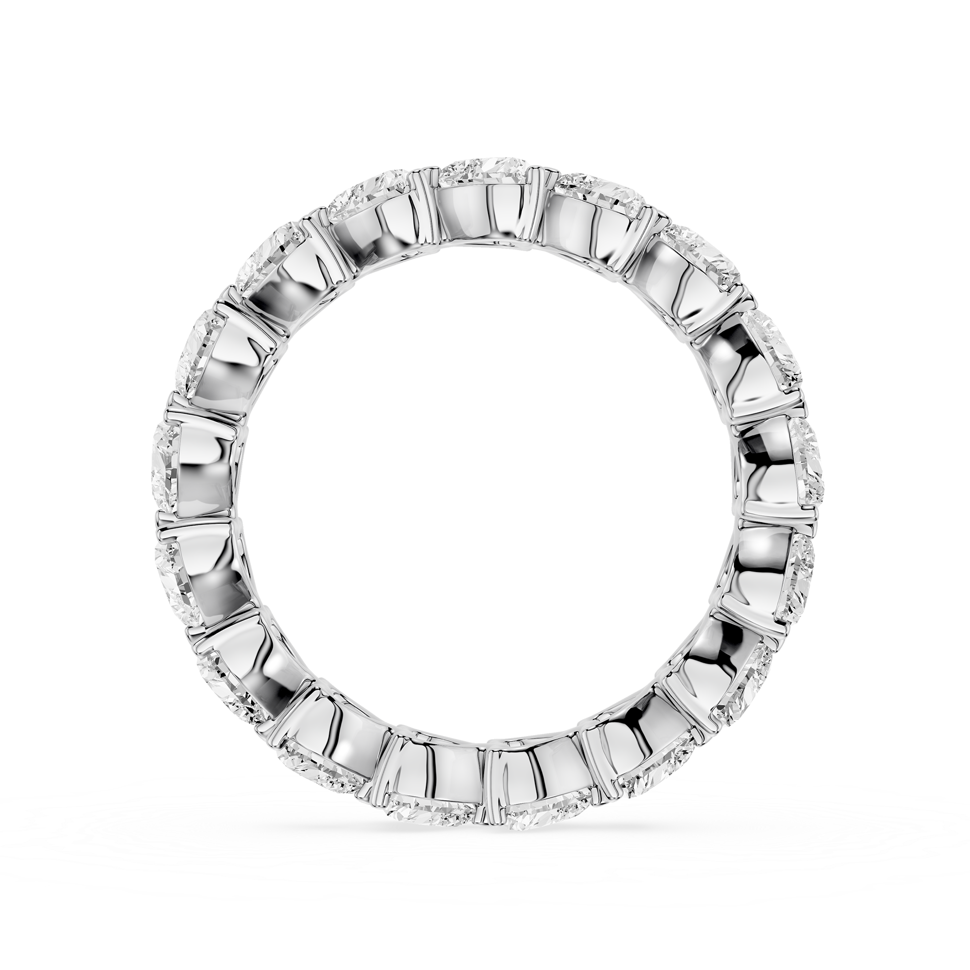 Silver ring with engraved design on a white background