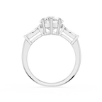 Diamond ring with a central gemstone and smaller stones on a white background