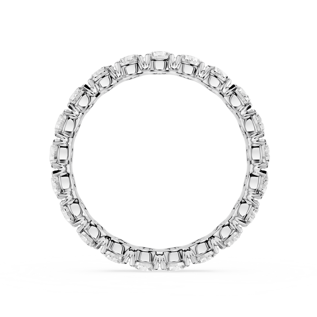 Silver ring with engraved design on a white background