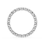 Silver ring with engraved design on a white background