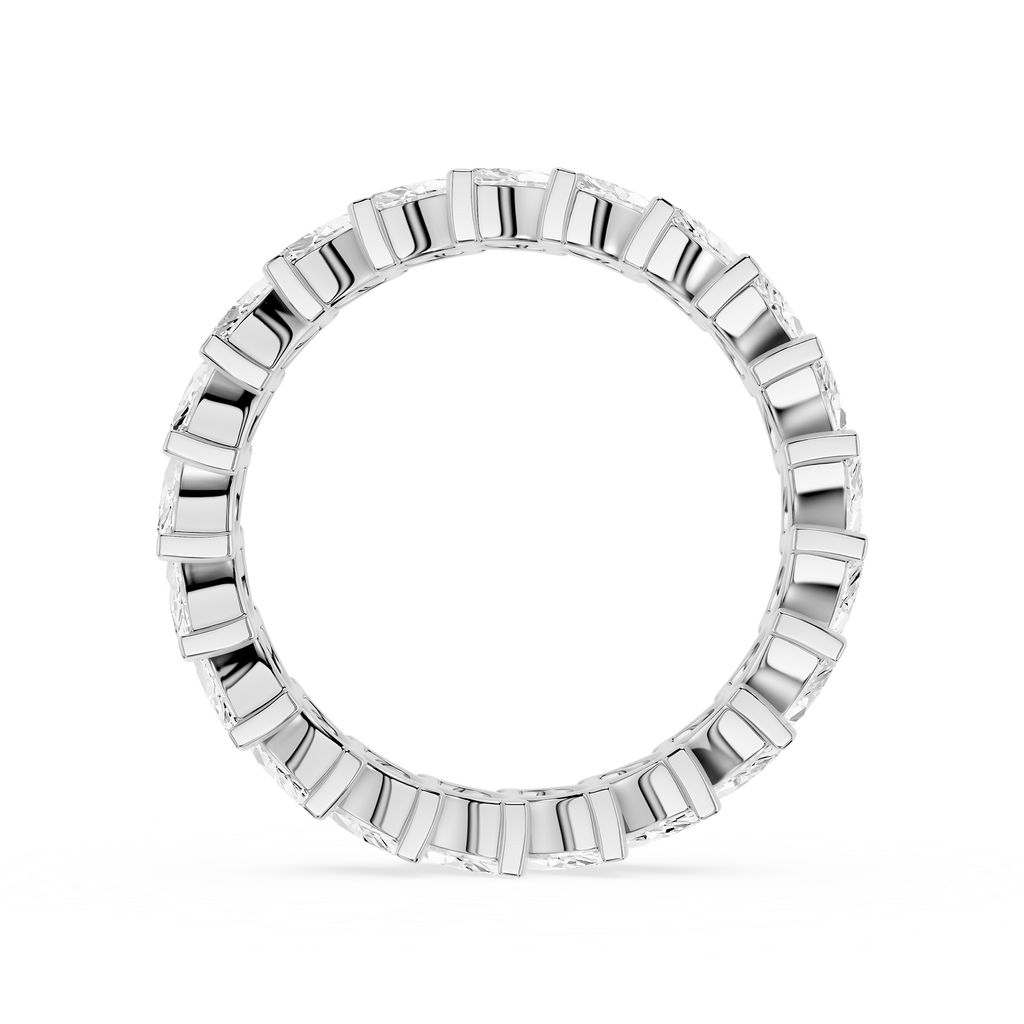 Silver ring with engraved design on a white background