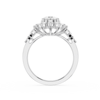 A white gold or platinum halo ring featuring a round center stone surrounded by a cluster of rectangular baguette and round side stones, shown on a plain white background.