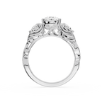 Silver ring with intricate design on a white background