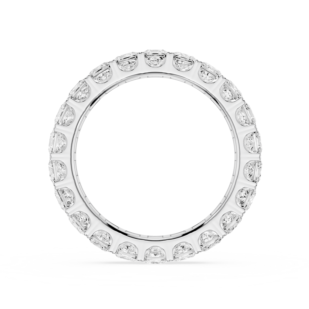 Silver ring with baguette-cut diamonds on a white background