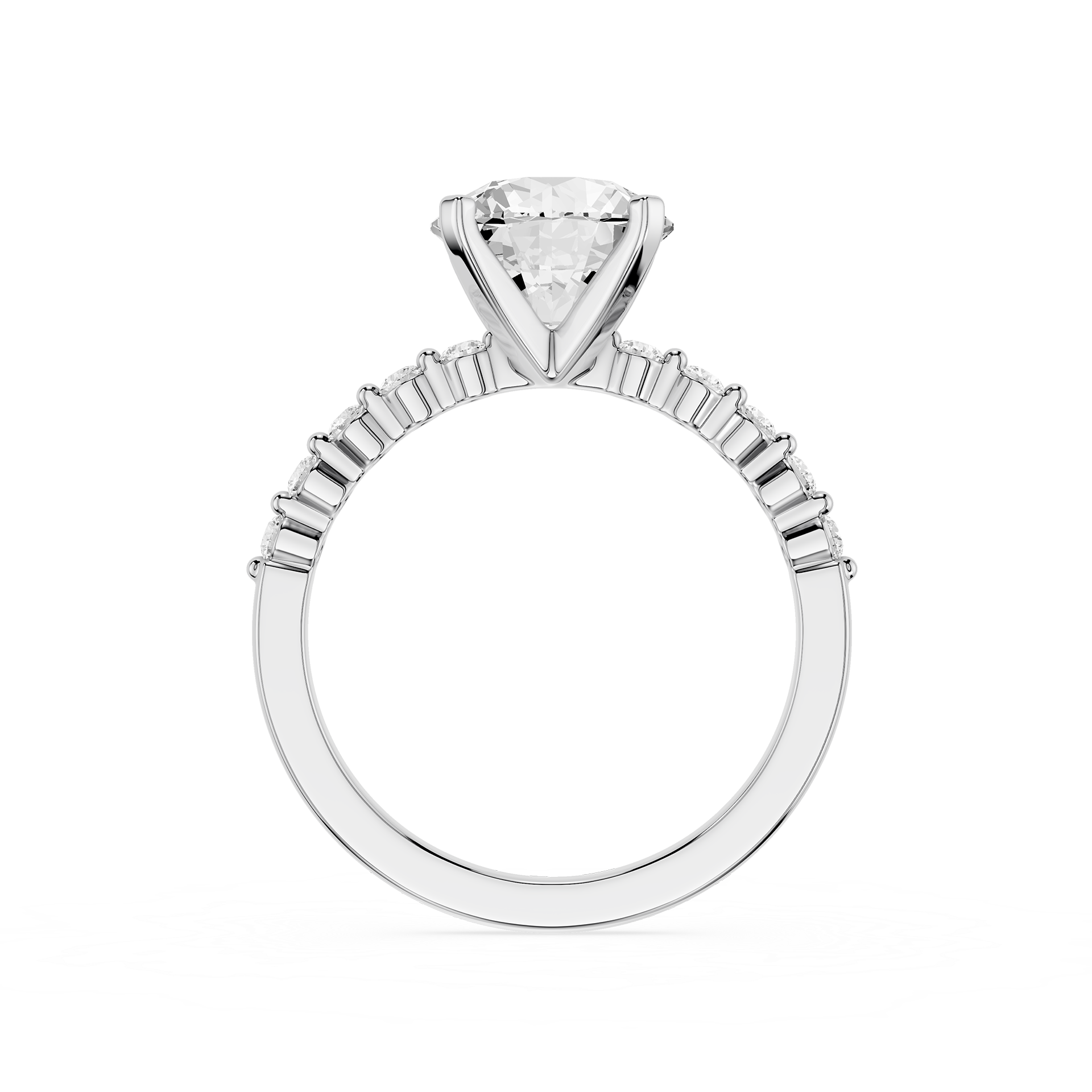 A silver-toned solitaire engagement ring featuring a large round-cut diamond center stone in a four-prong setting, with a shank accented by small baguette diamonds, shown on a plain white background.