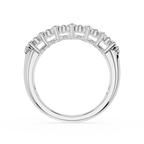 A silver half-pavé ring featuring baguette-cut diamonds set in a polished white metal band, shown against a plain white background.