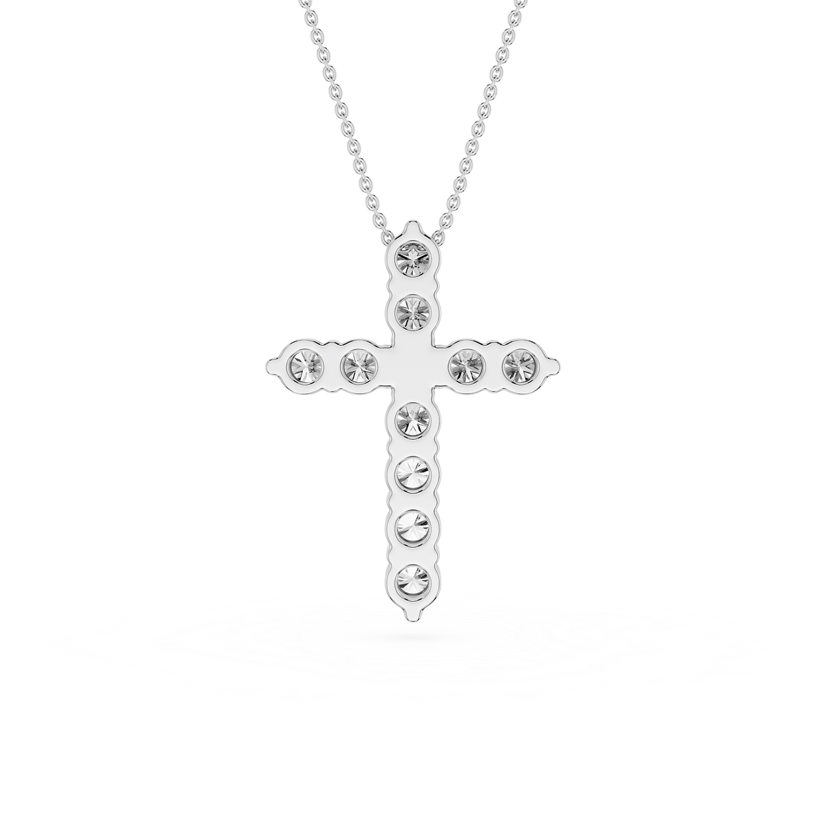 Silver cross necklace with clear stones on a white background