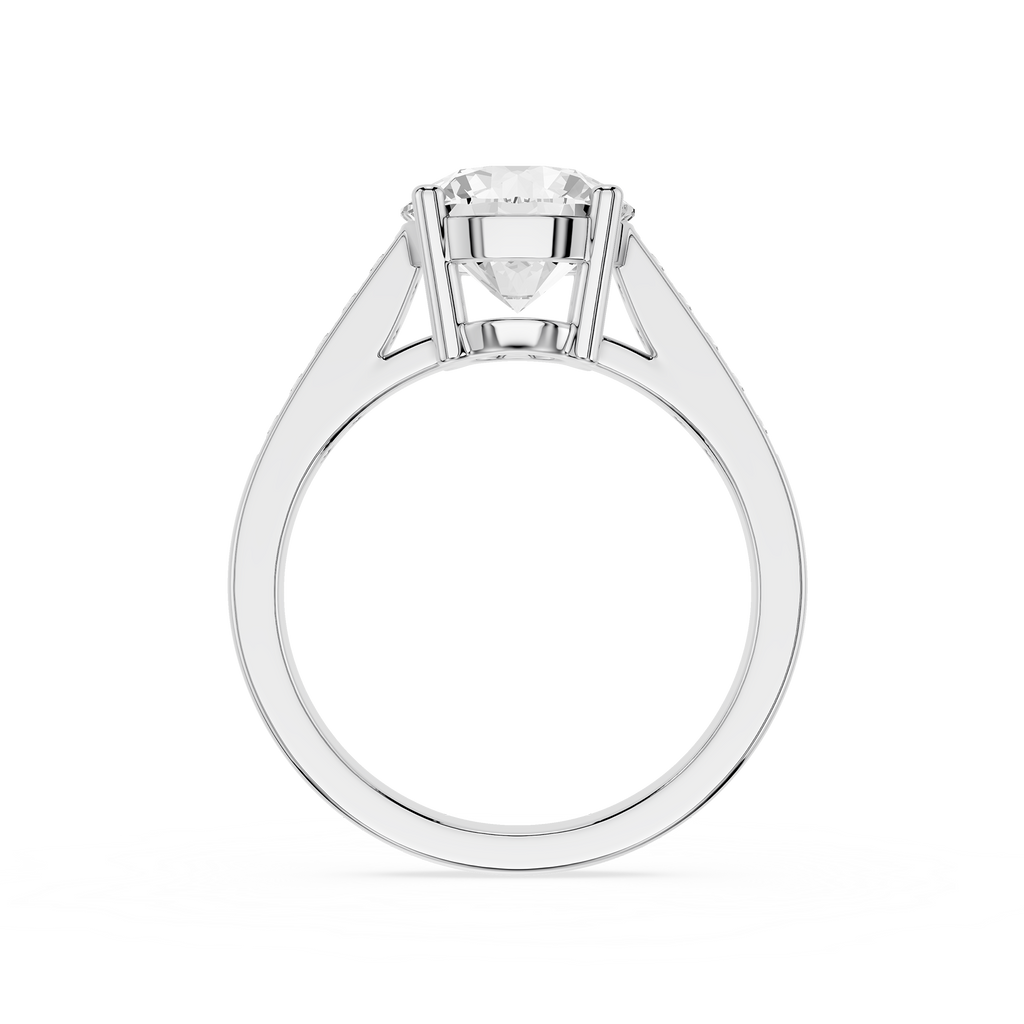A classic solitaire engagement ring featuring a round brilliant-cut diamond set in a polished white gold or platinum band with a four-prong setting, shown on a clean white background.