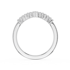 Diamond ring with baguette-cut stones on a white background