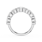 A White gold eternity ring featuring a continuous row of round brilliant-cut diamonds in a beveled setting, shown against a solid white background.