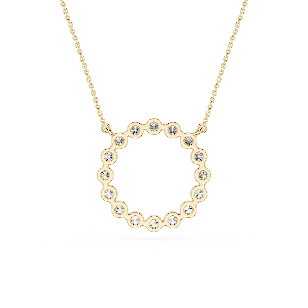 Gold necklace with a heart-shaped pendant on a white background