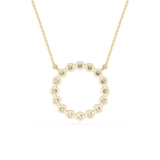 Gold necklace with a heart-shaped pendant on a white background