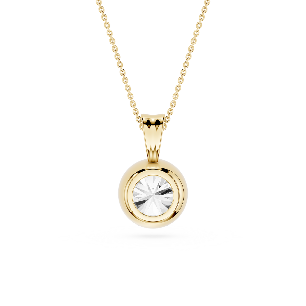 Gold pendant necklace with a clear gemstone on a white background