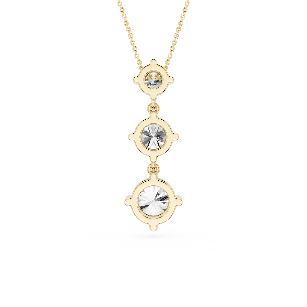 Rose gold necklace with three crystal stones on a white background