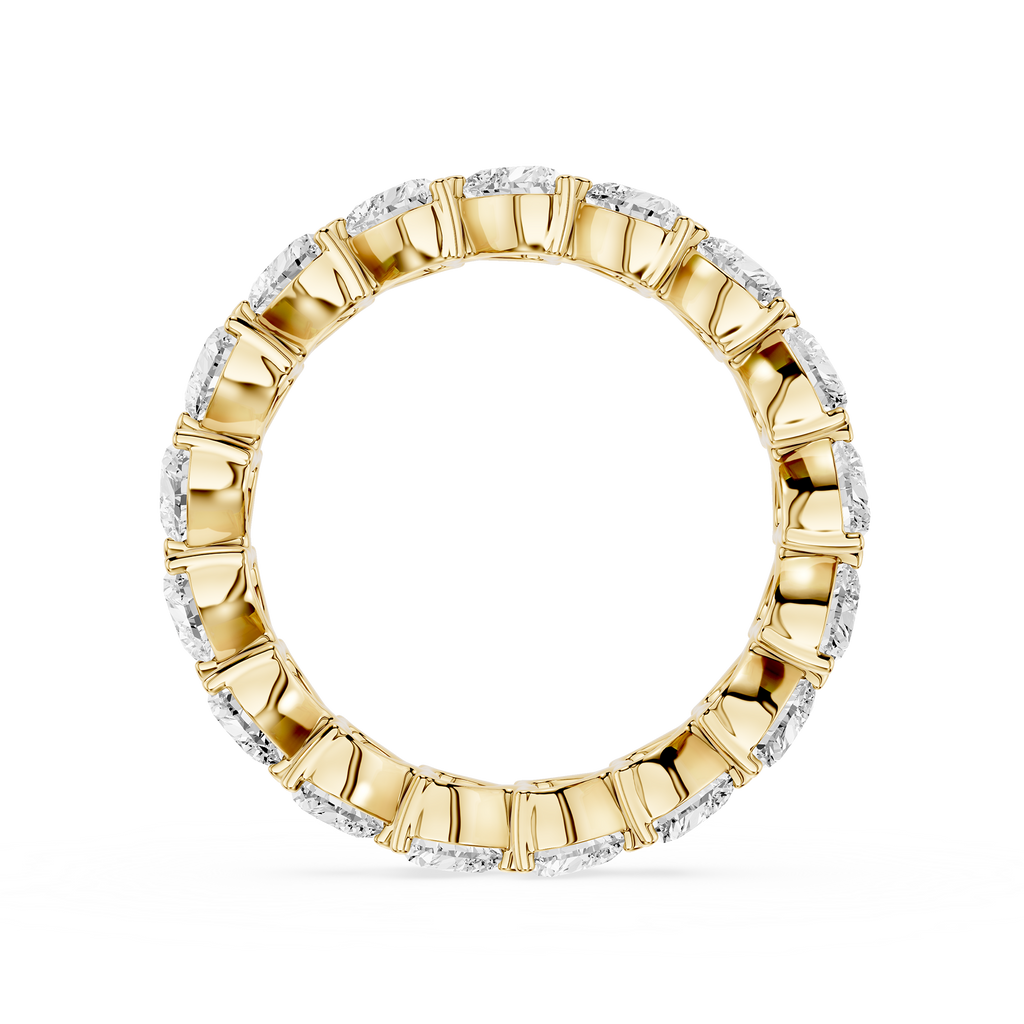 Gold ring with diamond accents on a white background