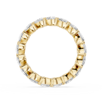 Gold ring with diamond accents on a white background
