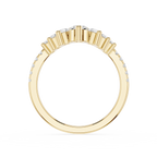 Rose gold ring with small diamonds on a white background