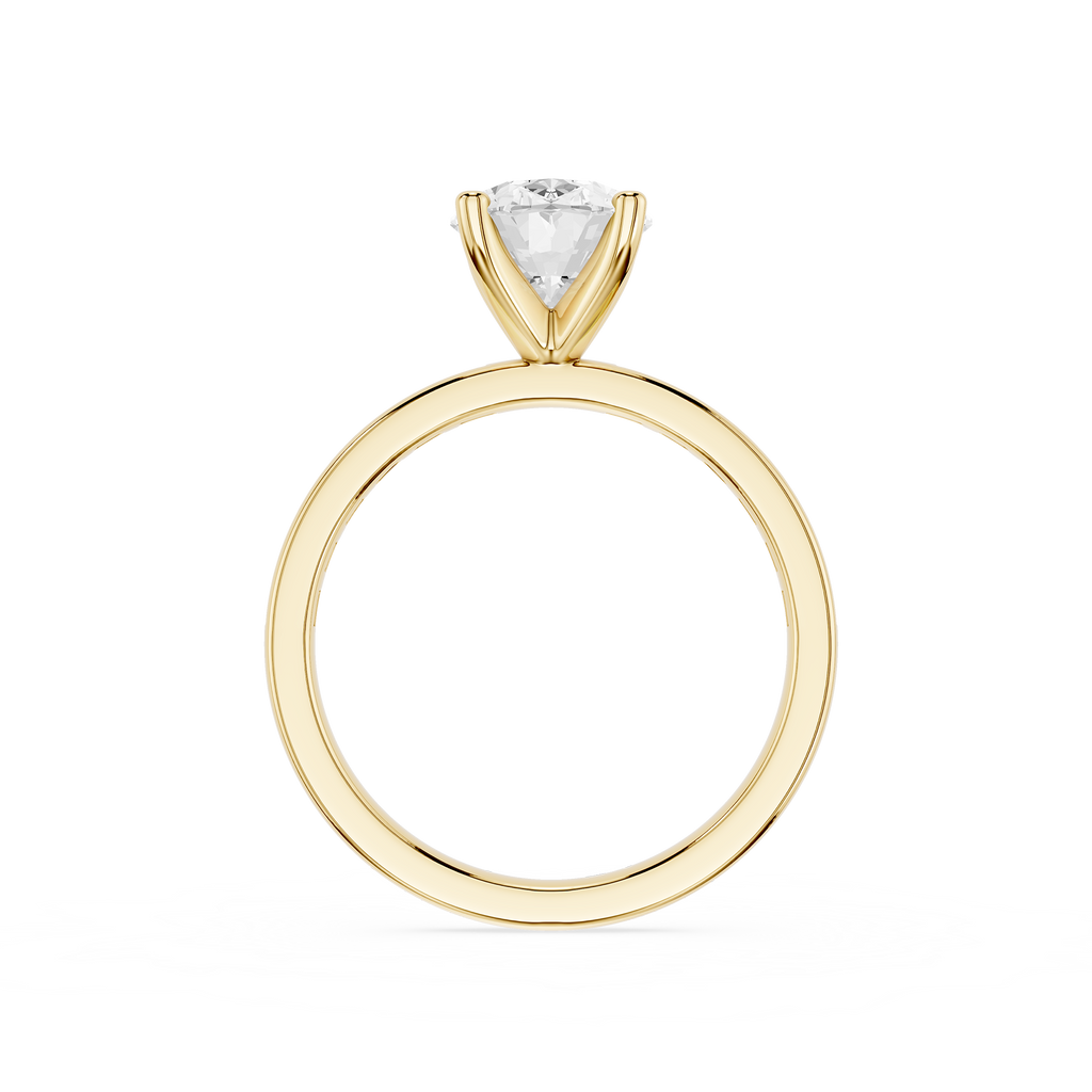 A yellow gold solitaire engagement ring featuring a triangular-cut clear gemstone in a prong setting, shown against a plain white background.