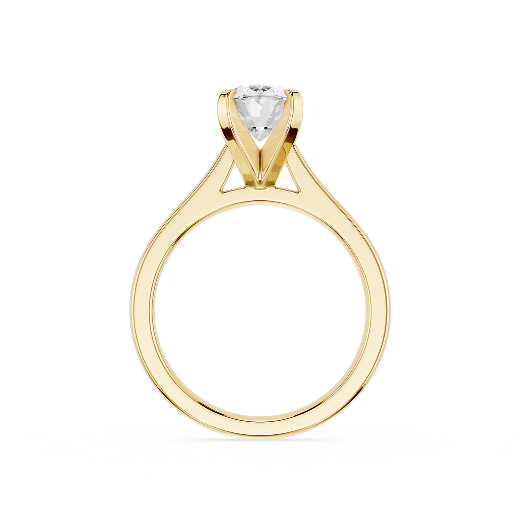Gold ring with a diamond on a white background
