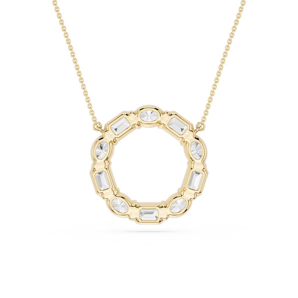 Gold necklace with a circular pendant featuring clear stones on a white background