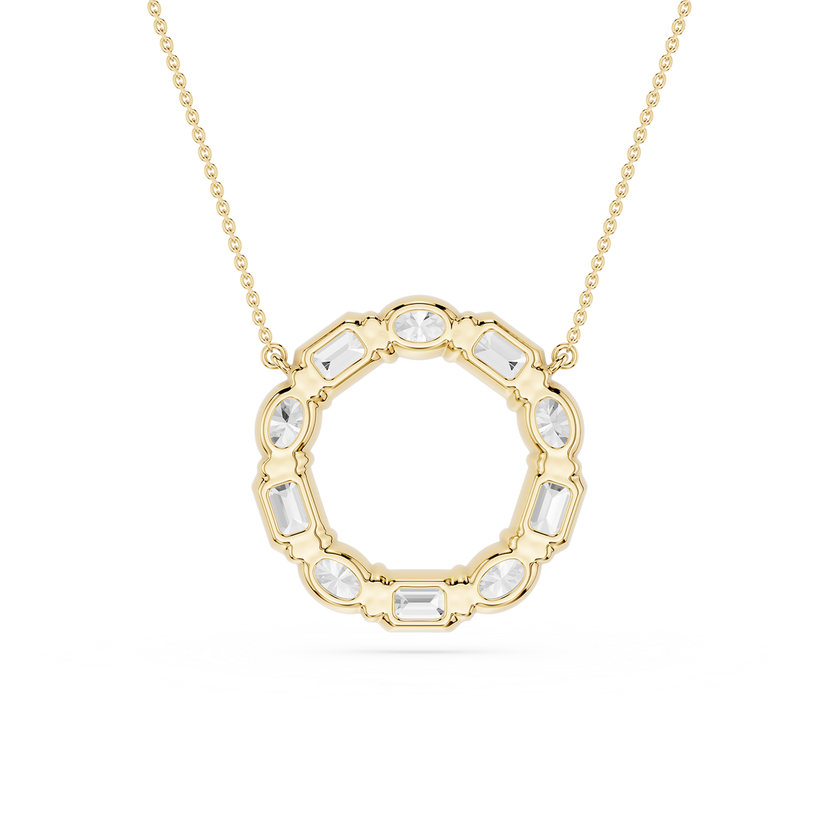 Gold necklace with a circular pendant featuring clear stones on a white background