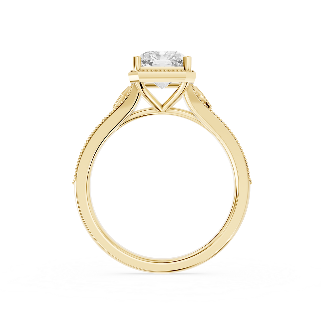 Vintage inspired radiant cut lab diamond engagement ring showcasing a decorative yellow gold split shank and milgrain edges