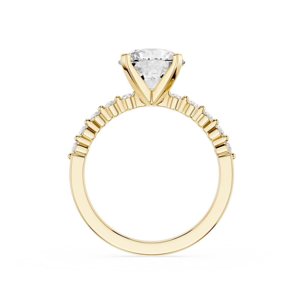 A yellow gold solitaire engagement ring featuring a triangular-cut diamond center stone and a halo of smaller diamonds along the shoulders, set against a plain white background.