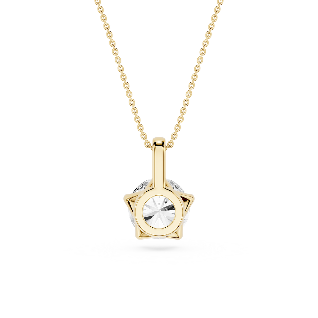 Gold necklace with a star-shaped pendant on a white background