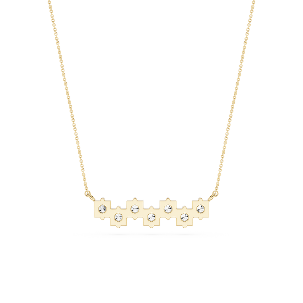 Gold necklace with a bar pendant featuring cut-out sections and small diamonds on a white background