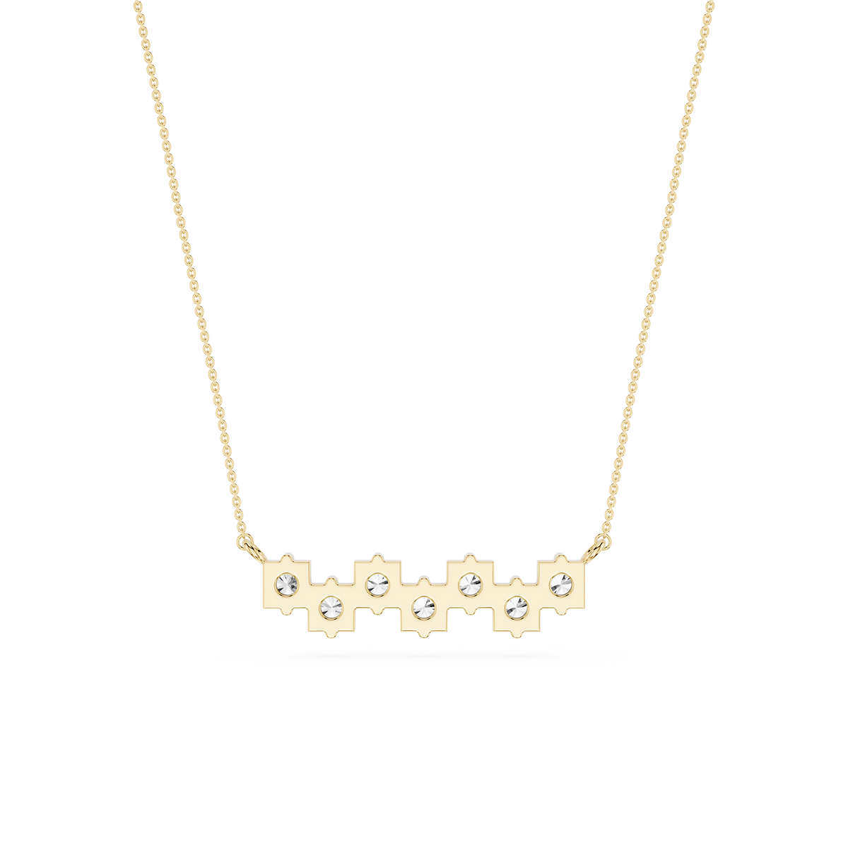 Gold necklace with a bar pendant featuring cut-out sections and small diamonds on a white background