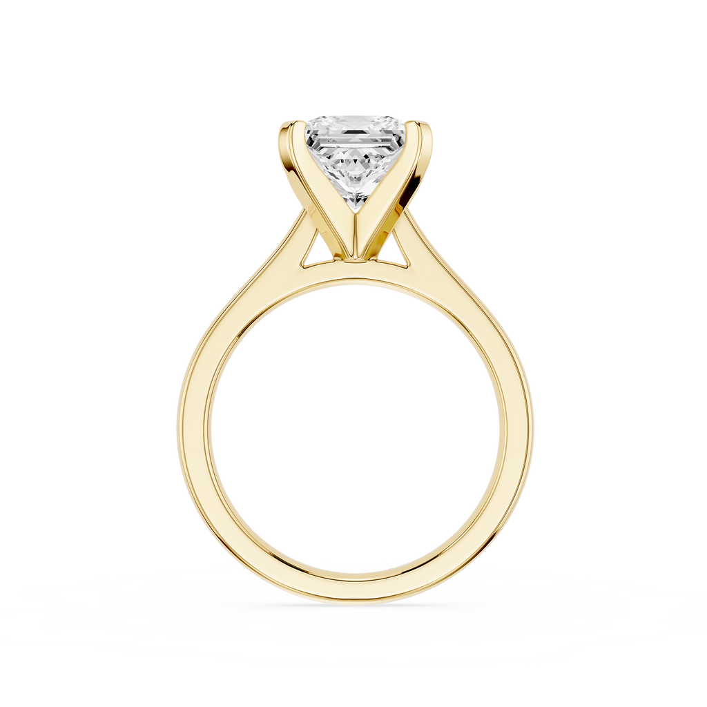 Gold ring with a diamond on a white background