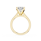 Gold ring with a diamond on a white background