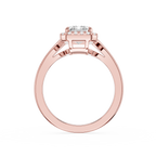 Rose gold ring with a diamond on a white background