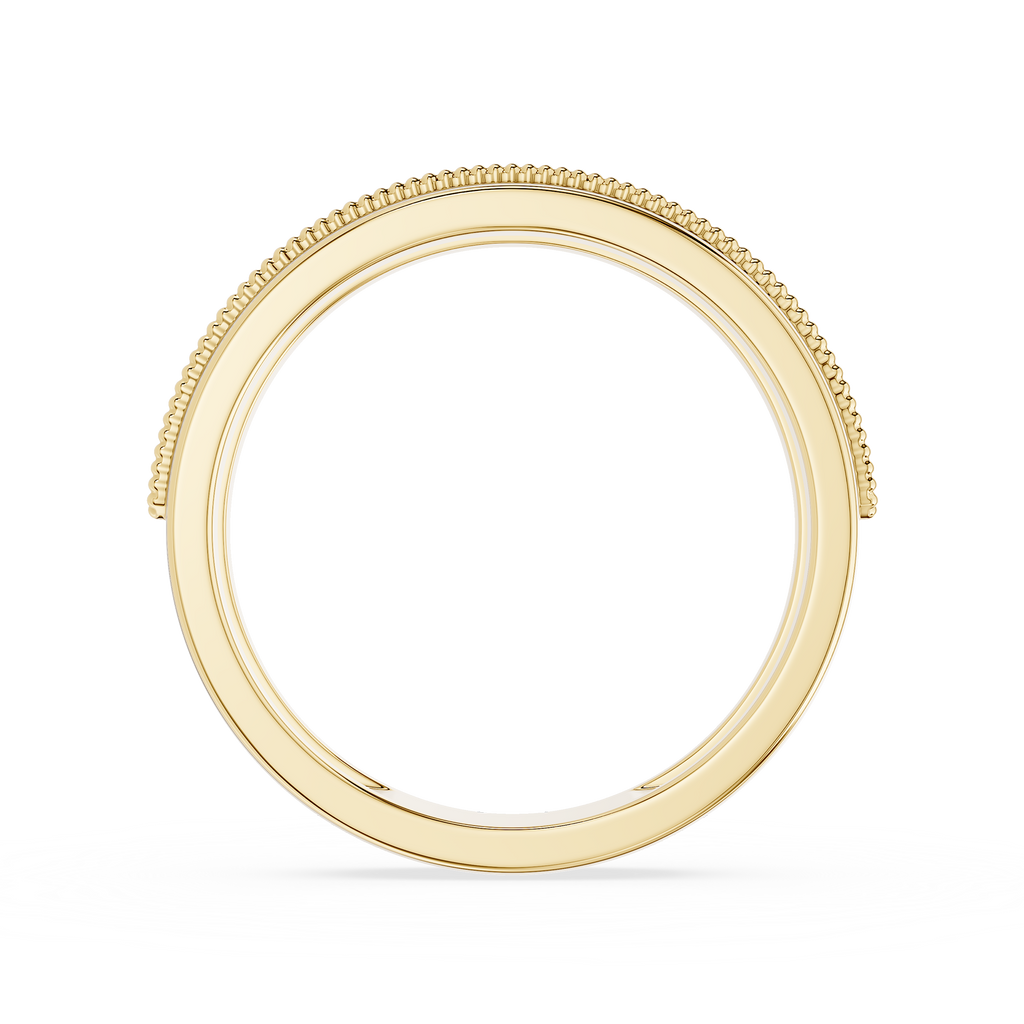 Gold ring with beaded design on a white background