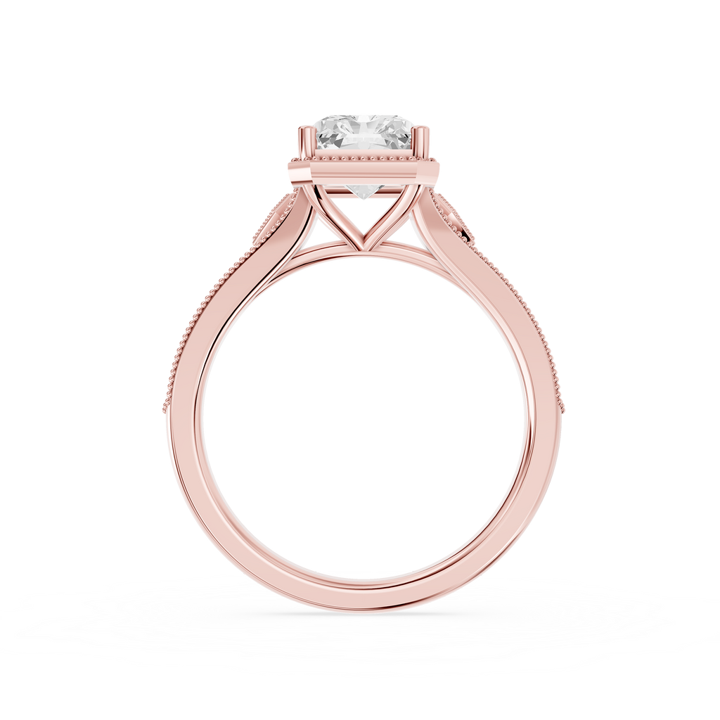 Geometric openwork and beaded borders frame this rose gold radiant cut lab diamond ring with a four prong center stone