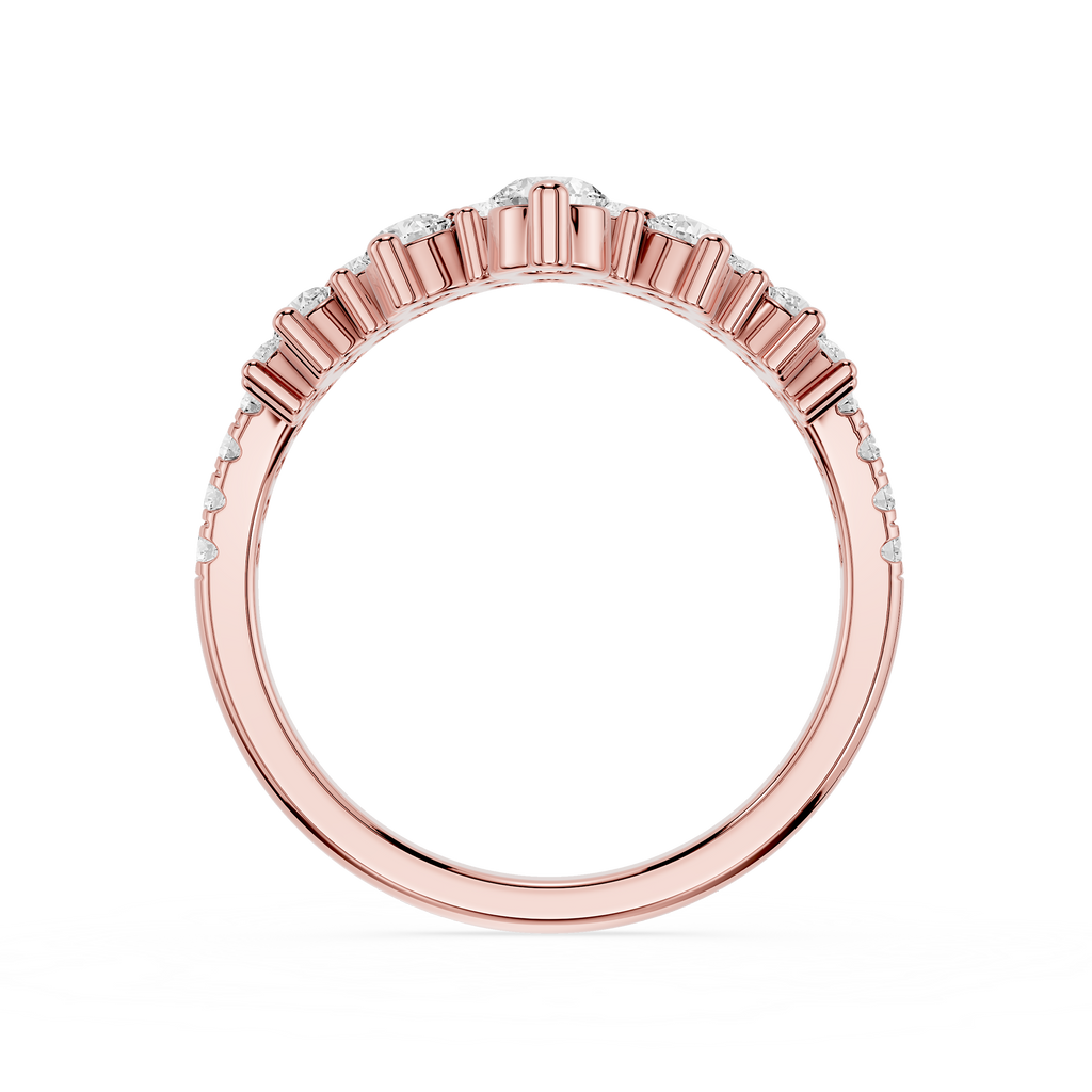 Rose gold ring with diamond accents on a white background