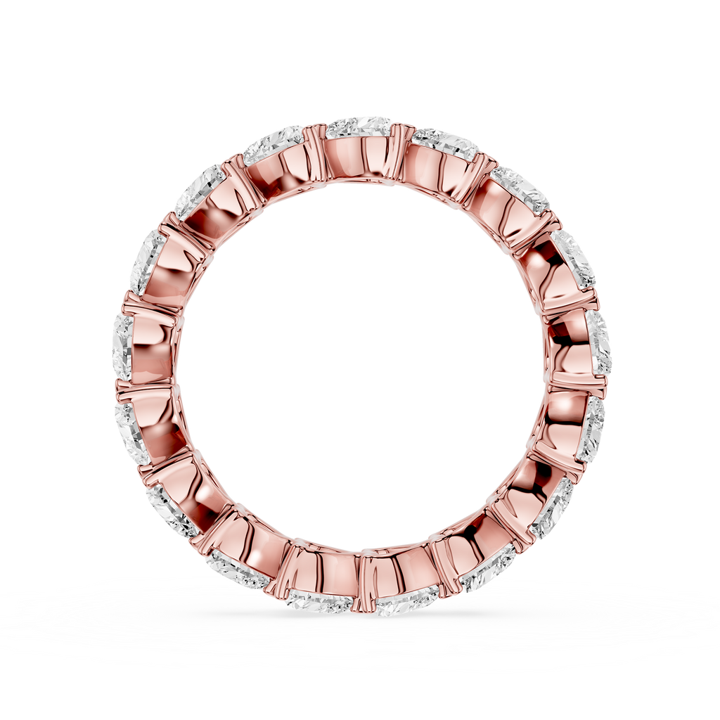 Rose gold ring with diamonds on a white background