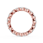 Rose gold ring with diamonds on a white background