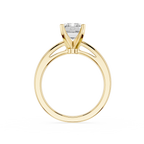 Gold ring with a diamond on a white background