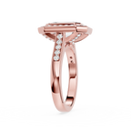 Rose gold ring with diamond accents on a white background