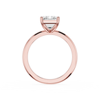 Rose gold ring with a diamond on a white background