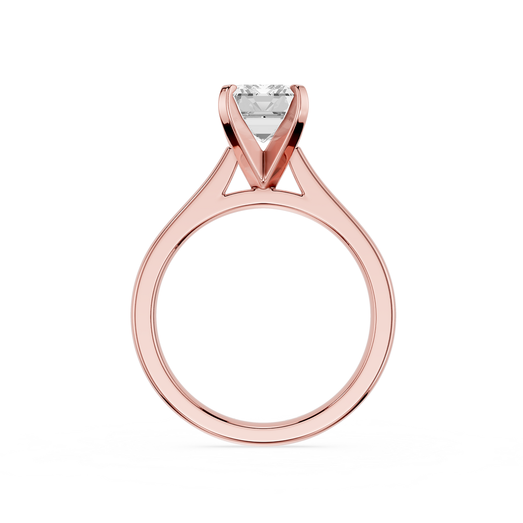 Rose gold ring with a diamond on a white background
