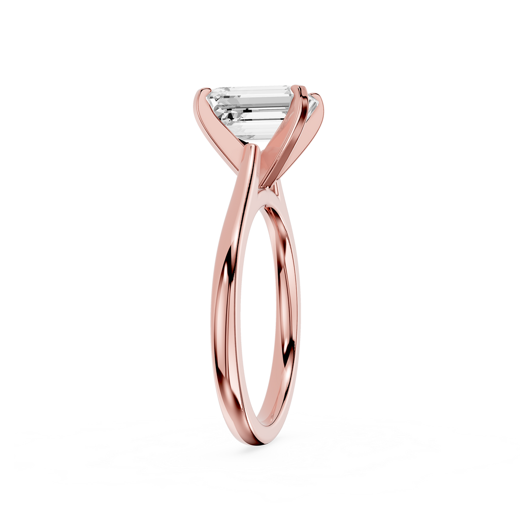 Rose gold ring with a diamond on a white background