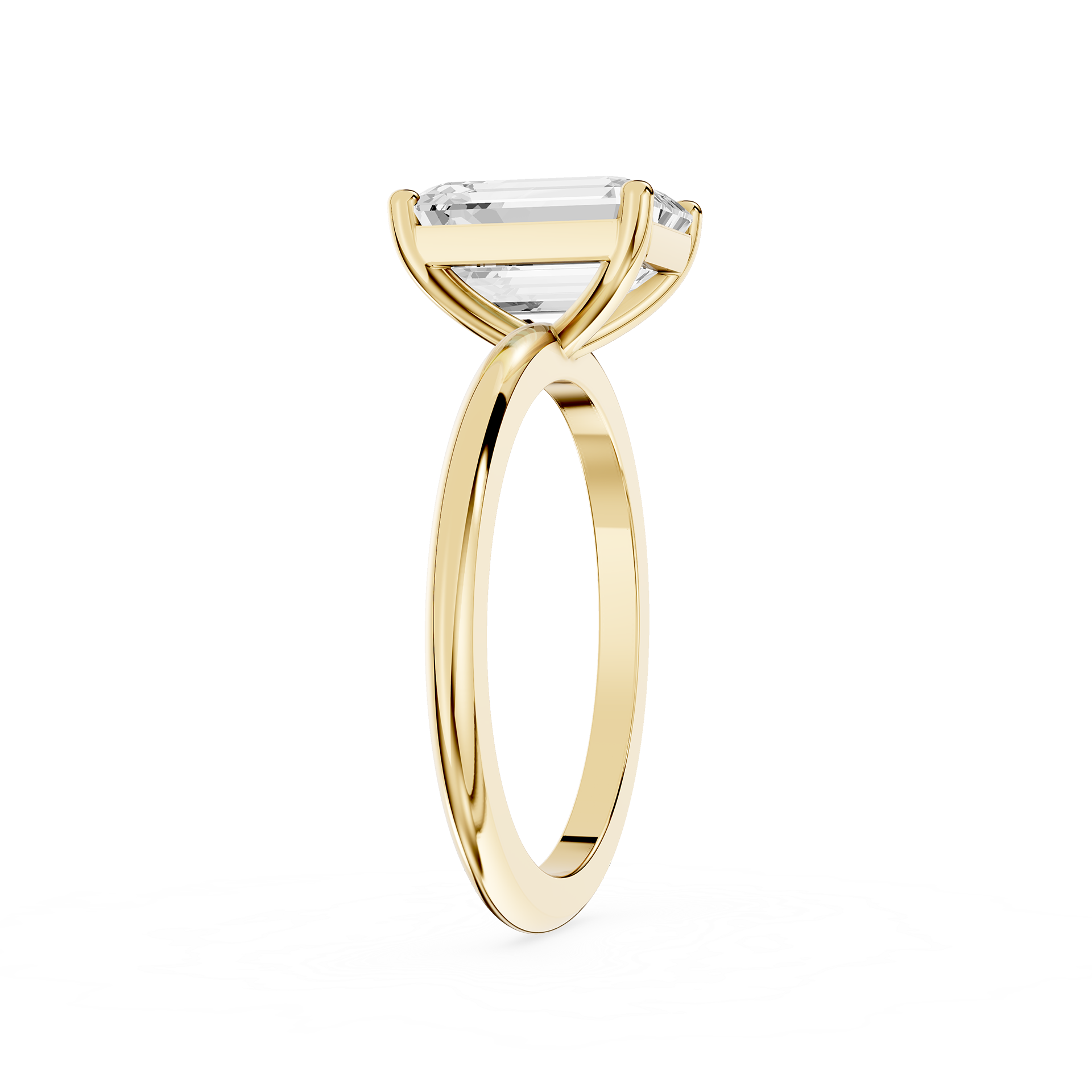 Gold ring with a diamond on a white background