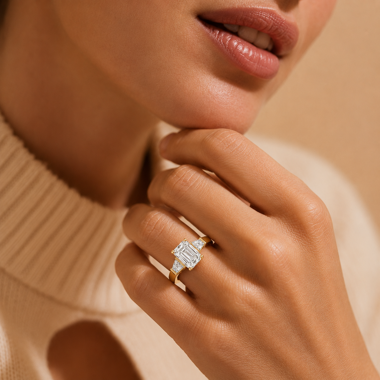 Close-up of a hand wearing a diamond ring with a blurred background