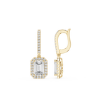 Gold earrings with emerald-cut gemstones on a white background