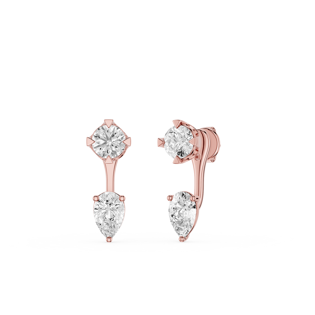 Rose gold earrings with clear gemstones on a white background