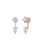 Rose gold earrings with clear gemstones on a white background